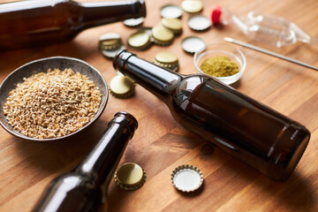 Bottle with supplies for making homemade beer