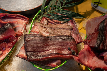 Fresh tuna black and red meat for sale at an Asian wet market. 