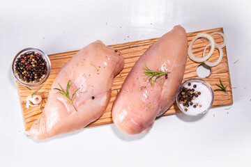Assortment different pieces chicken meat. Cooking white meat, butcher shop concept. Chicken legs,...