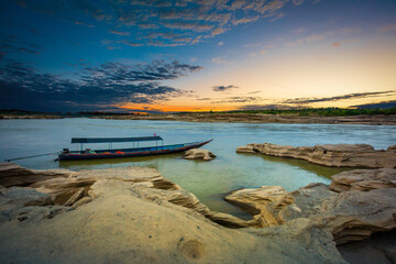 Sunrise landscape photo with boat, mountain,Sam Phan Bok, Ubon Ratchathani, Thailand 