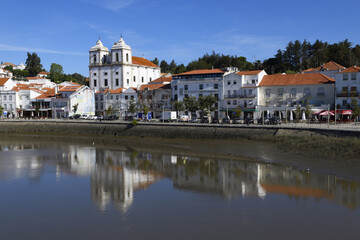 Naklejka premium City center, Santiago church and promenade along the Sado river, Alcacer do Sal, Lisbon coast, Portugal