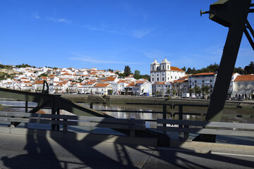 Fototapeta na wymiar Santiago church viewed through a drawbridge, Alcacer do Sal, Lisbon coast, Portugal