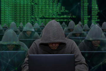Hackers are sitting at laptops and computers on an abstract background, attacking and hacking servers with a virus. Creation and dissemination of disinformation, DDOS attack.