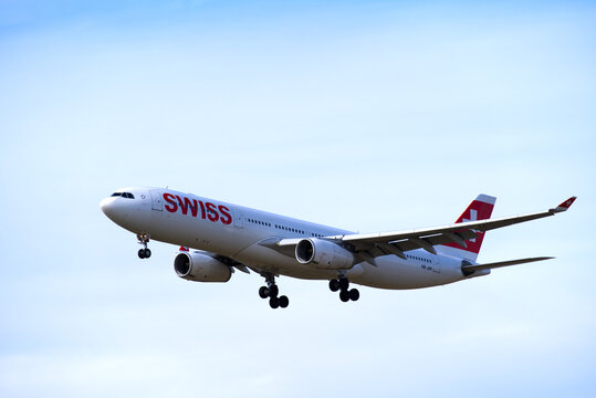 Swiss airplane Airbus A330-343 register HB-JHI landing at Zürich Airport on a cloudy winter day. Photo taken February 24th, 2022, Zurich, Switzerland.
