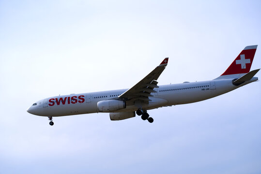 Swiss airplane Airbus A330-343 register HB-JHI landing at Zürich Airport on a cloudy winter day. Photo taken February 24th, 2022, Zurich, Switzerland.
