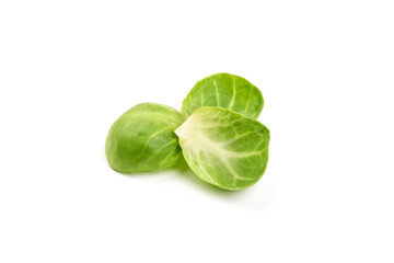 Fresh green Brussels sprouts, isolated on white background. High resolution image.