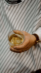 whiskey in hand