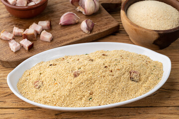 Farofa, typical brazilian manioc flour side dish with seasonings