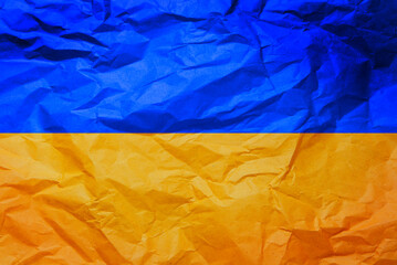 Symbol of Ukraine crumpled paper blue-yellow color. Patriotism.