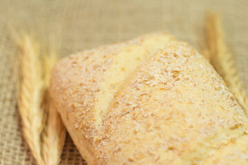 superclose of  bread on a straw table