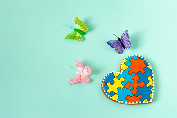 Heart shaped gingerbread with puzzles and butterflies