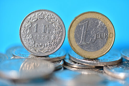 euro and swiss franc coin