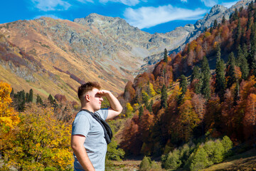 Naklejka na ściany i meble Teen tourist in the mountains of Abkhazia.