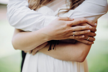 Wedding couple. Bride and groom embracing at wedding day