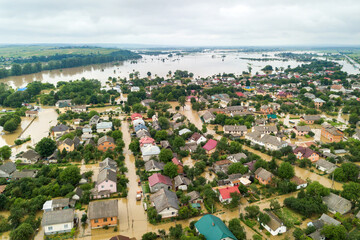 Aerial view of flooded houses with dirty water of Dnister river in Halych town, western Ukraine
