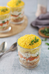 Mimosa salad in transparent glass	