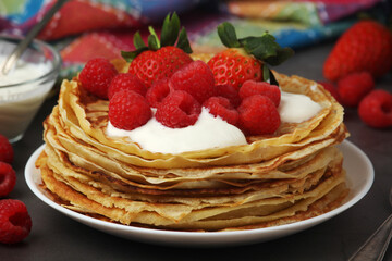 Russian cuisine national dish bliny with fresh berries