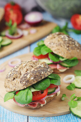 Homemade sandwiches with ham and vegetables