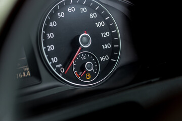 Empty fuel warning light in car dashboard. Fuel pump icon. gasoline gauge dash board in car with...