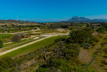 KIZLAN, MUGLA, TURKEY: Fields, mountains and windmills in the the village of Kizlan, near Datca on a sunny day.