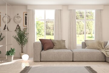 White living room with sofa and summer landscape in window. Scandinavian interior design. 3D illustration