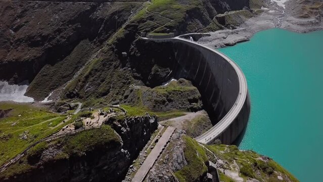Flight over of Kaprun reservoir Mooserboden Stausee, Austria.
