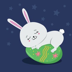 Easter bunny sleeping on egg