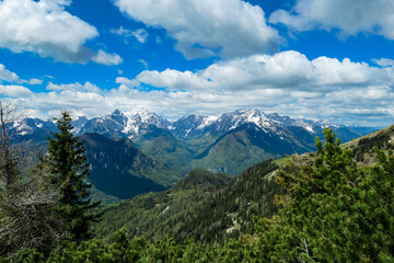 Panoramic view in spring from Frauenkogel on mount Mangart in the Julian Alps, Friuli, Italy. Border Austria, Italy, Slovenia. Triglav National Park. Upper Drava valley. Summit