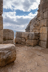 Castle arrowslit in he South Western Tower of Nimrod fortress (castle), located in Northern Golan, at the southern slope of Mount Hermon, the biggest Crusader-era castle in Israel