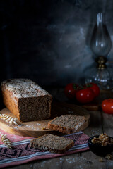 Homemade rye sliced ​​bread on a wooden rustic table
