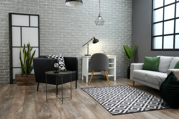 Black armchair and modern workplace in interior of living room