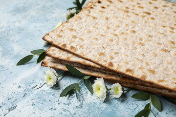 Jewish flatbread for Passover on color background, closeup