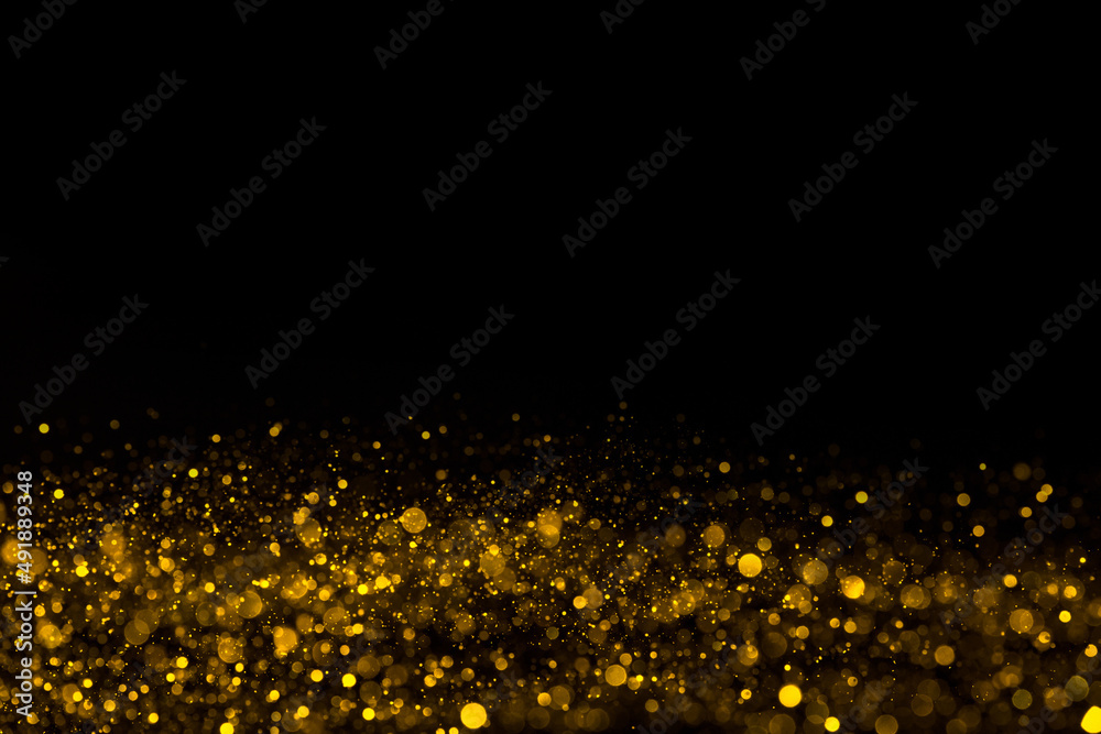 Wall mural Golden glitter shiny dust particles bokeh abstract frame border background