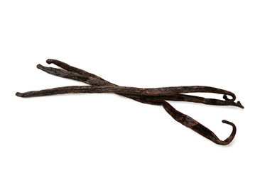 Obraz premium Dried vanilla pods isolated on white
