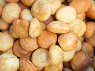 Traditional Kazakh Asian baursak dish prepared with dough on a pan with oil
