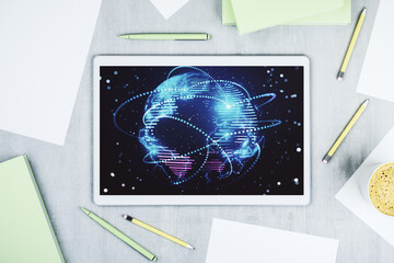 Modern digital tablet display with abstract graphic world map with connections, globalization concept. Top view. 3D Rendering