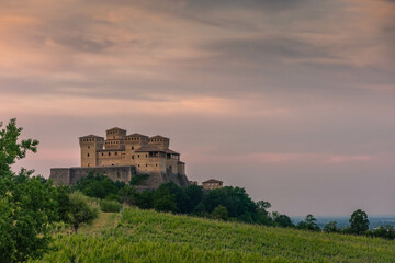 Fototapeta na wymiar Beautiful sunset over castle of Torrechiara, Parma, Italy