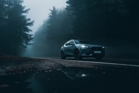 Trencin, Slovakia - November 2021: new SUV Cupra Formentor in the foggy forest.