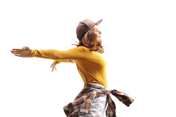 Full length profile shot of a young woman on wind throwing hands backwards