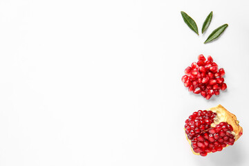 Tasty ripe pomegranate piece on white background