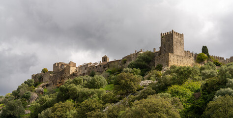 view of the castle of Castellar de la Frontera under an overcast expressive sky