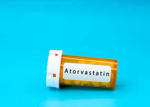 Atorvastatin Medical vial with pills. Medical pills in orange Plastic Prescription. most popular medicine