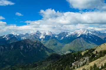 Panoramic view in spring from Frauenkogel on mount Mangart in the Julian Alps, Friuli, Italy. Border Austria, Italy, Slovenia. Triglav National Park. Upper Drava valley. Summit