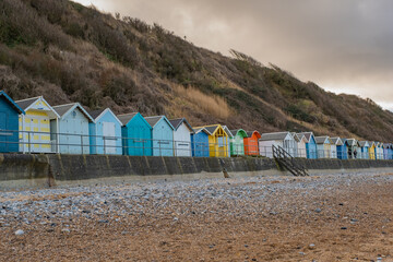 Traditional wooden beach huts on the promenade in the seaside town of Cromer on the North Norfolk...