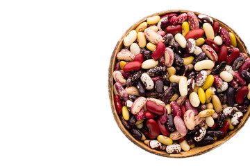 Beans  on the bowl and wooden background.