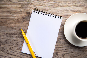 blank notepad and coffee cup