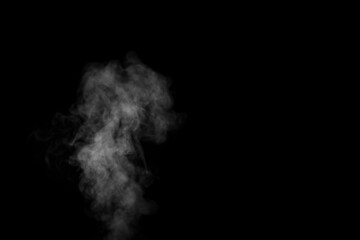 Perfect mystical curly white steam or smoke isolated on black background. Abstract background fog...