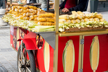 Famous and cheapest street foods in Istanbul Boiled and Grilled Corn. Smoked grilled roasted corn...