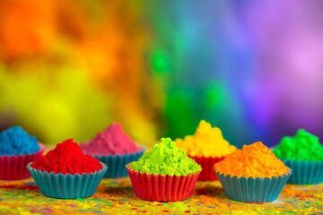 Happy Holi! A colorful festival of colored paints made from powder and dust. Colorful holi powder...