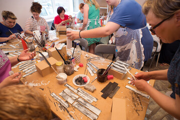 Women in art workshop making decoupage boxes - 491913975